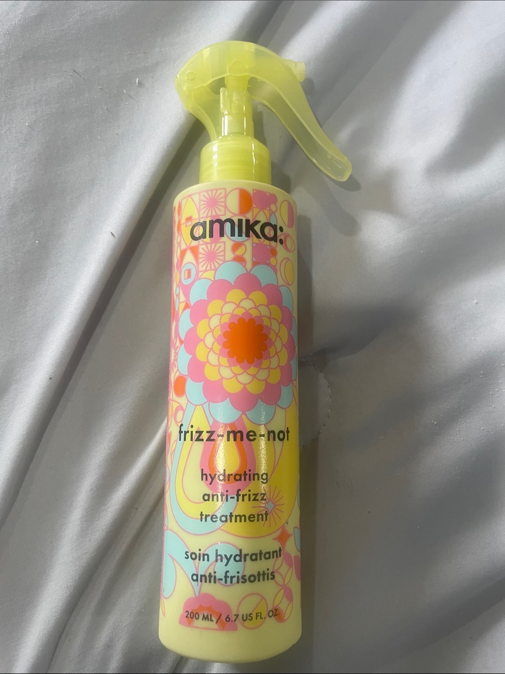 Amika frizz me not treatment spray